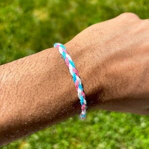 Adjustable braided trans pride thread bracelet